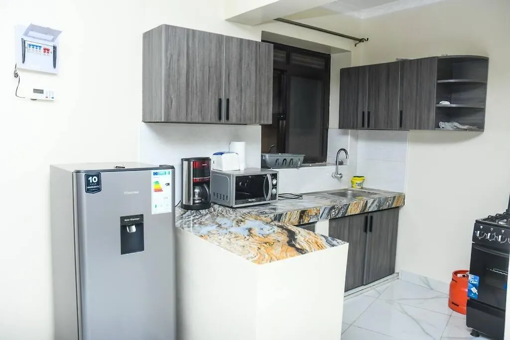 Ivyrose Luxury Apartment Кампала Уганда